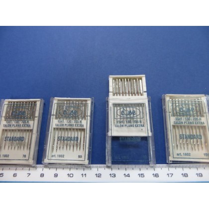 Agujas máquina talón plano
